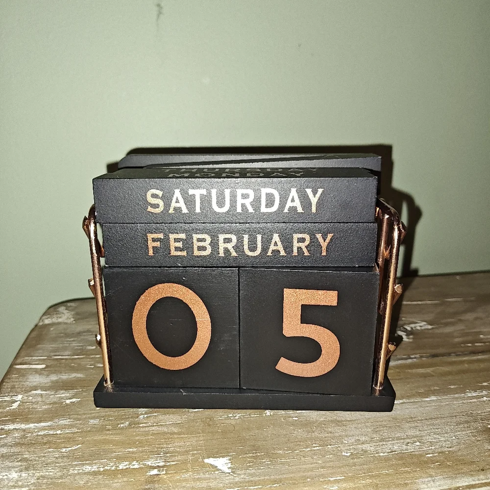 OwlCrate The Invisible Life of Addie LaRue wooden block desk calendar